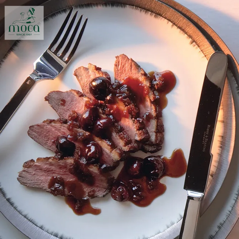 Pan-seared duck breast with cherry sauce
