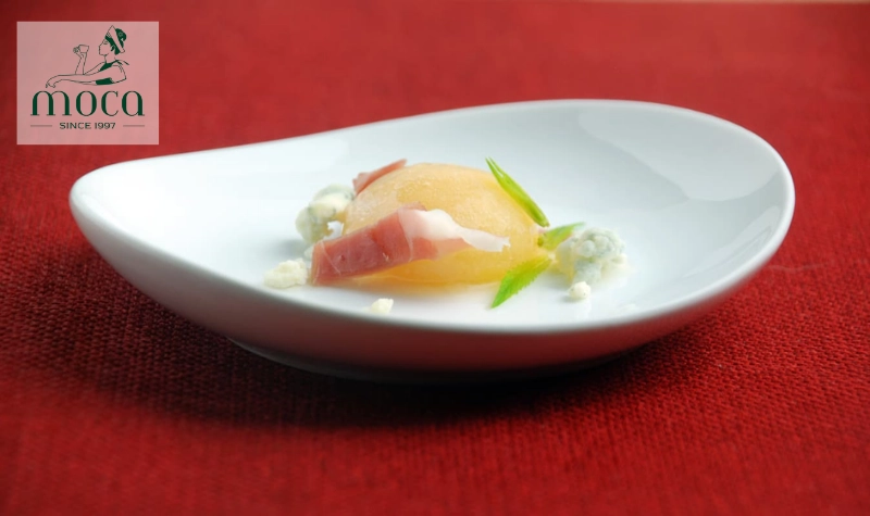 A molecular gastronomy marvel that transforms liquid into edible jewels—delicate, dramatic, and full of flavor