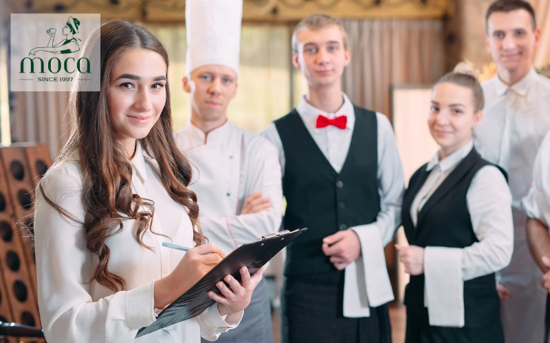 Fine dining roles wear distinct uniforms, showing purpose and prestige—from maître d’ to sommelier to kitchen staff.