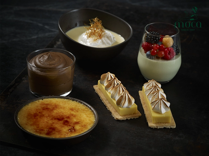 Innovative desserts in the modern pastry kitchen feature unexpected yet harmonious ingredient pairings: sweet and savory, herbs and spices, and seasonal local produce, creating a rich and surprising culinary experience.