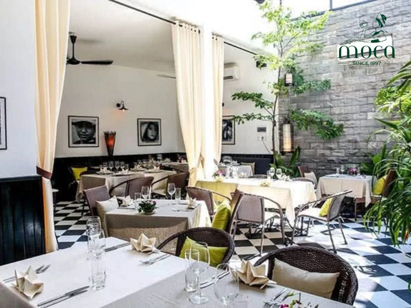 Timeless elegance in a colonial villa: where guests are immersed in a refined dining experience shaped by historical architecture and exquisite cuisine.