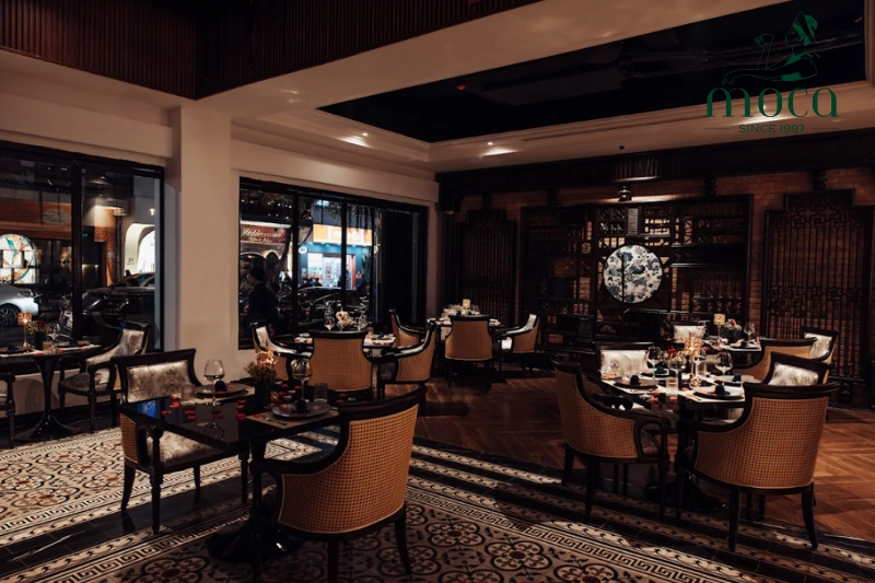 Moca Dining: Old French Style meets Indochine heritage, from the sweeping central staircase to the warm ambient lighting, crafting a romantic and refined atmosphere.